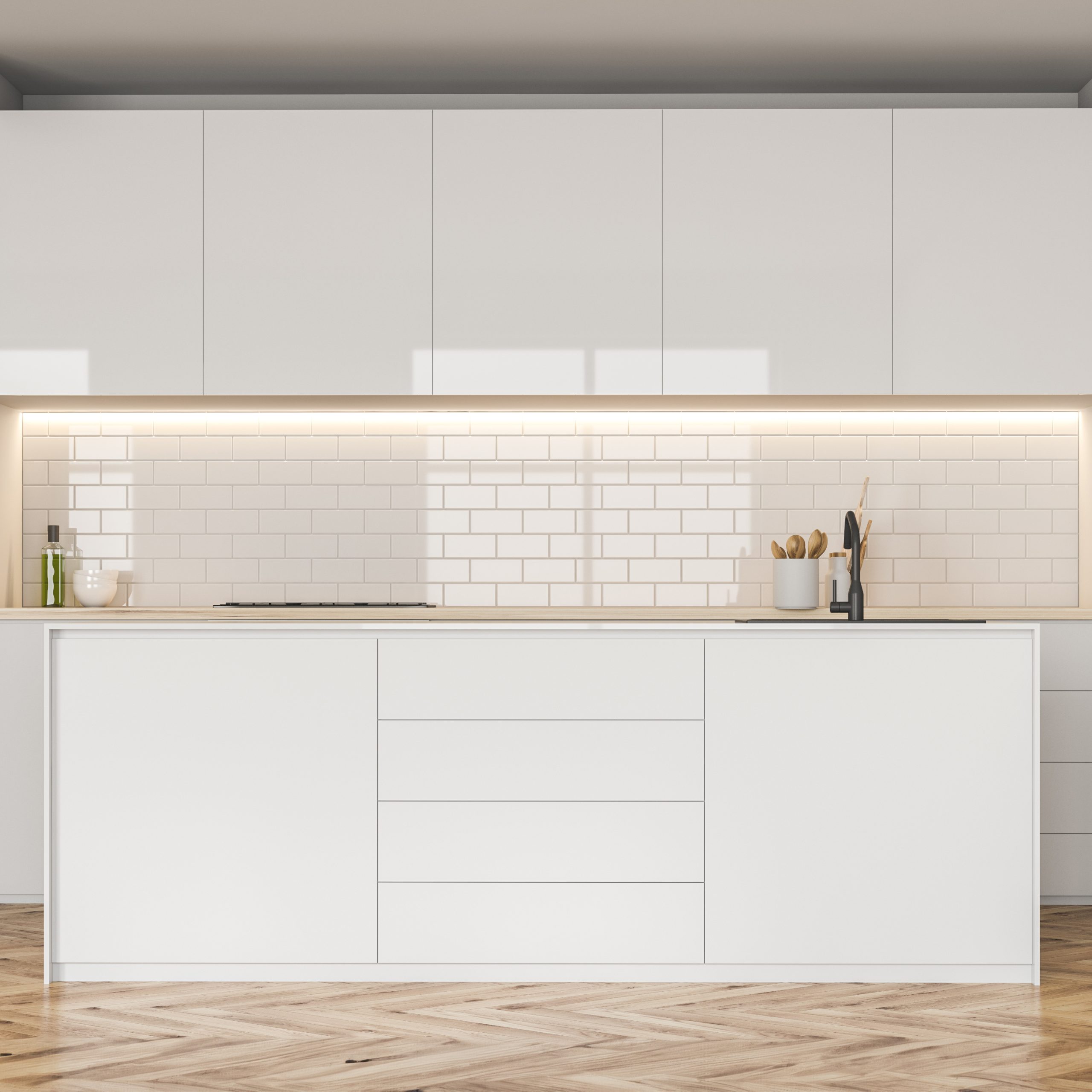 Modern white kitchen tiling and herringbone floor